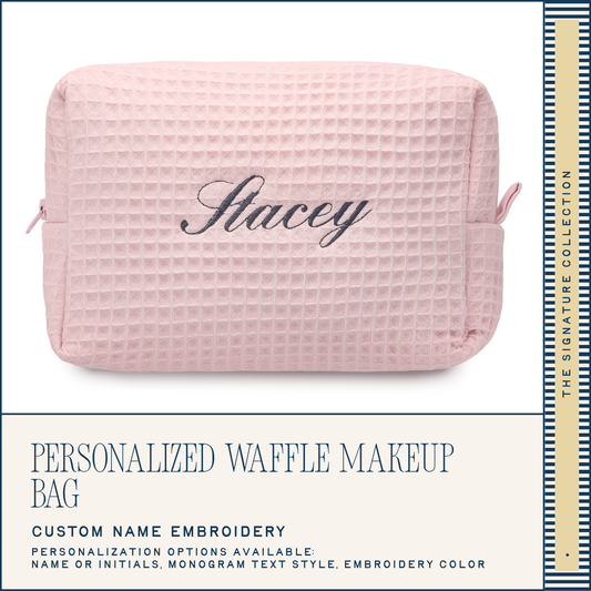 Pink waffle-textured makeup bag with 'Stacey' embroidered on it, on a white background.