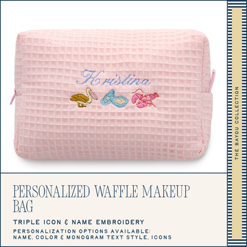 Pink waffle texture makeup bag with embroidered design and text on a white background