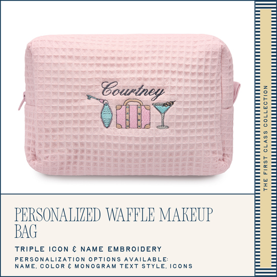 Pink waffle-textured makeup bag with embroidered design and text on a white background